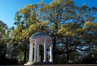 UNC-Chapel Hill's iconic Old Well stands proud under a Carolina blue sky on University Day 2016.