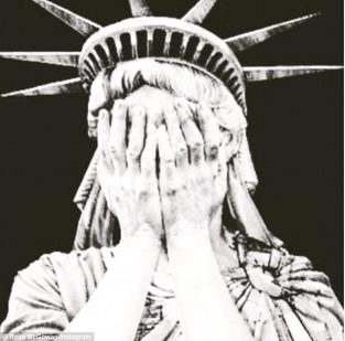 Statue of Liberty crying, hands over eyes. Image courtesy of Daily Mail.