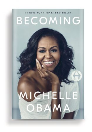 Cover of book, Becoming, with close-up photo of Michelle Obama.